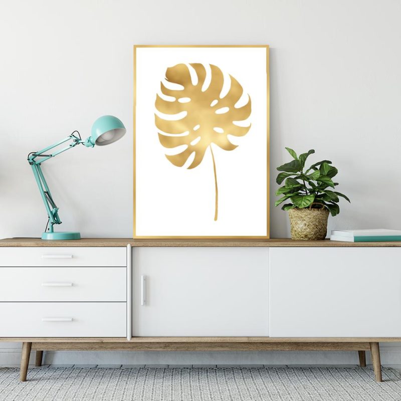 Plakat z motywem złotego liścia