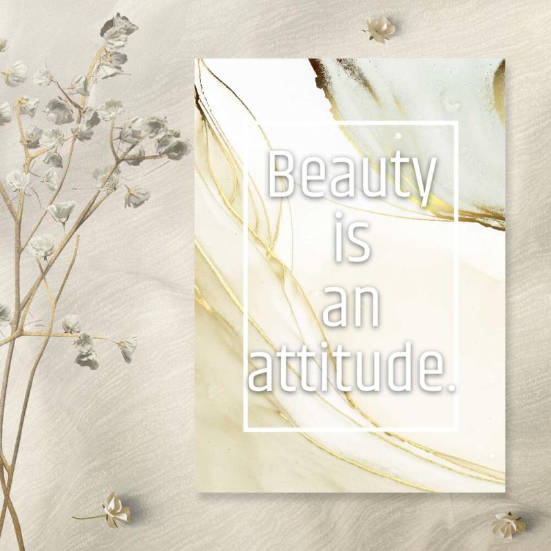 Plakat w jasnych barwach z maksymą beauty is an attitude